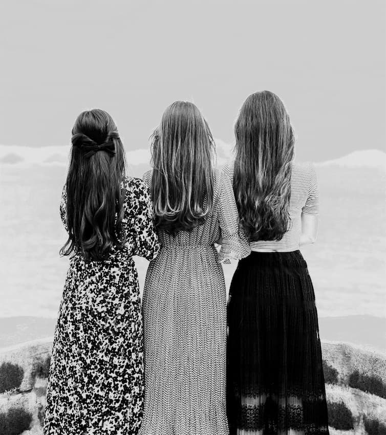 women-standing 3 women standing